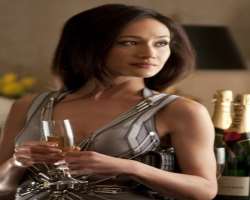 Maggie Q consuming alcohol